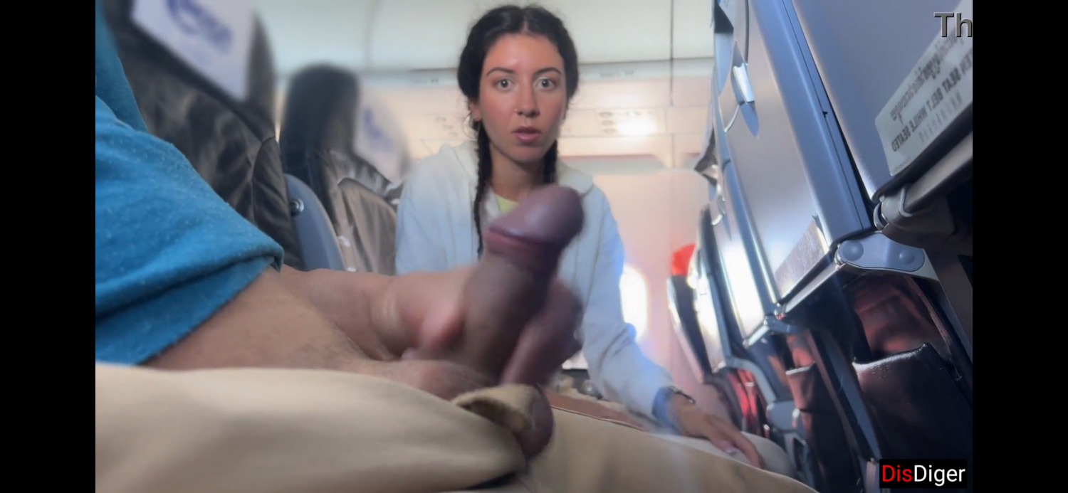 Latina is shock by the dick and gives a handjob in the airplane